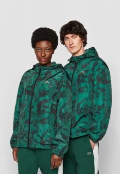 Lacoste X Netflix Unisex - Summer Jacket - Green/Black 9 Lacoste X Netflix Unisex - Summer Jacket - Green/Black -Indicode Men Wear Shop 2950b7711f774a0d9984d5c2533d132e