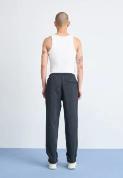 Nike Sportswear CLUB PANT - Tracksuit Bottoms - Black -Indicode Men Wear Shop 39f84b2ef8204186af93909592676366