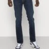 Nudie Jeans Grim Tim - Slim Fit Jeans - Dark Blue Denim