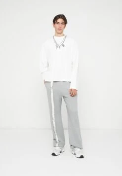 LOGO PANTS UNISEX - Tracksuit Bottoms - Grey