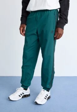 Adidas Originals FIREBIRD PANTS - Tracksuit Bottoms - Aurora Ivy/black